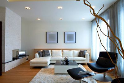 What do we do with our furniture when we refinish our hardwood floors?