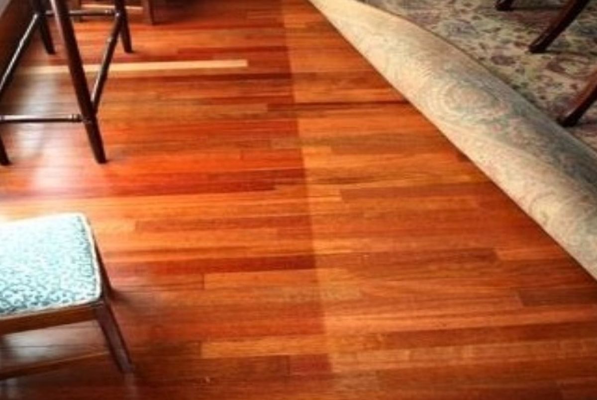 Why are my wood floors changing color and what can I do?